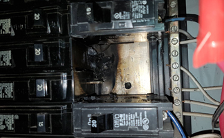 Emergency Electrical Repair for Burnt Breaker from overheating Reliant Electrical in Pasco
