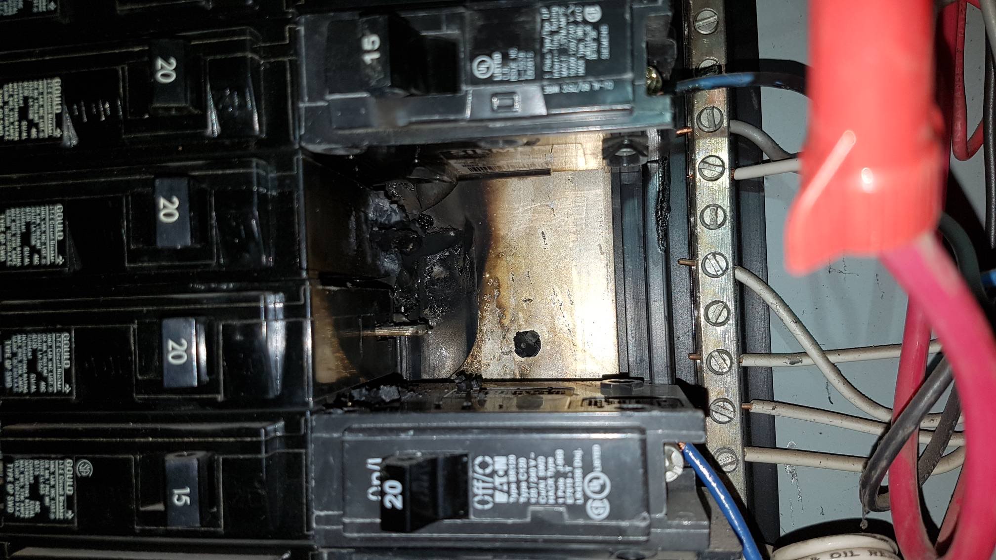 Emergency Electrical Repair for Burnt Breaker from overheating Reliant Electrical in Pasco County FL evaluated